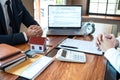 Sale purchase contract to buy a house, Real estate agent are presenting home loan and giving keys to customer after signing Royalty Free Stock Photo