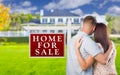 For Sale Real Estate Sign, Military Couple Looking at House Royalty Free Stock Photo