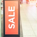 Sale red sign at mall. Discount concept. Market interior design Royalty Free Stock Photo