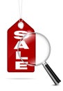 SALE red tag and loupe Royalty Free Stock Photo