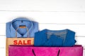 Sale with shoes and shirts Royalty Free Stock Photo