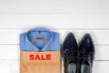 Sale with shoes and shirts Royalty Free Stock Photo