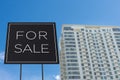 A for sale sign of a RFO or Ready for Occupancy condominium unit. Real estate concept, brand new, resale or RFO