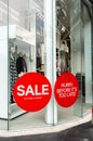 Sale Sign Sticker on the outside of Fashion Store Windows Royalty Free Stock Photo