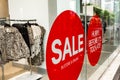 Sale Sign Sticker on the outside of Fashion Store Windows Royalty Free Stock Photo