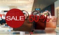 sale sign on store showcases