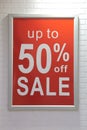 Sale sign on wall