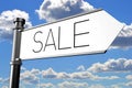 Sale - signpost with white arrow, sky Royalty Free Stock Photo