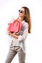 Sale and style concept. Lady holds pink purse. Royalty Free Stock Photo