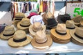 Sale of sun hats in a market Royalty Free Stock Photo