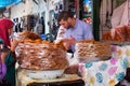 TETOUAN, MOROCCO - MAY 24, 2017: Sale of sweets on the old food market in historical part of Tetouan in Northern Morocco Royalty Free Stock Photo