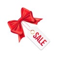 Sale tag with red gift bow. Vector sale paper label illustration for christmas discount promotion Royalty Free Stock Photo