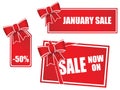 Sale tags with bows Royalty Free Stock Photo