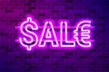 SALE text with dollar and euro signs glowing purple neon lamp sign Royalty Free Stock Photo