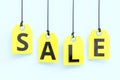 `Sale` text on yellow tags Royalty Free Stock Photo