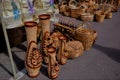 Sale of various wicker products at a peasant fair on a city street. Royalty Free Stock Photo