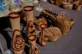 Sale of various wicker products at a peasant fair on a city street. Royalty Free Stock Photo