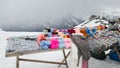 Sale of warm woolen things on the top of one of the mountains. Handmade knitted items: socks, gloves, hats. Travel to the Caucasus Royalty Free Stock Photo