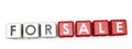 For sale word concept on cube block isolated Royalty Free Stock Photo
