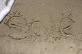 Sale. Word on the sand Royalty Free Stock Photo