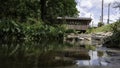 Salem Shotwell Covered Bridge reflected in Rocky Brook Royalty Free Stock Photo