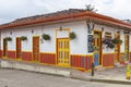 Salento, Quindio, Colombia - February 2022. The beautiful doors and facades of the houses.