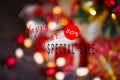 Sales on Christmas and New Year holidays. Blurred Festive decoration with informative inscription of 50 percent discount Royalty Free Stock Photo