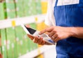 Sales clerk using tablet Royalty Free Stock Photo