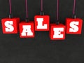 SALES concept on hanging red toy blocks