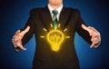 Sales guy has bright idea in the hand Royalty Free Stock Photo