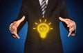 Sales guy has bright idea in the hand Royalty Free Stock Photo