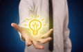 Sales guy has bright idea in the hand Royalty Free Stock Photo