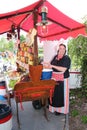 Sales lady dressed in old Dutch clothing