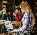 Sales Manager working on laptop with a marketing report Royalty Free Stock Photo