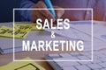 Sales and Marketing concept. Documents on a desk.