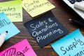 Sales and operations planning concept. Memo sticks on desk. Royalty Free Stock Photo
