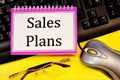 Sales plan-writing on a Notepad. Long-term vision of future actions, development of a method for achieving the goal of stable long Royalty Free Stock Photo