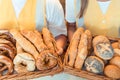 Sales women in bakery presenting fresh bread Royalty Free Stock Photo