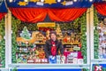 Salesgirl at a stall at the Christmas Fair Royalty Free Stock Photo