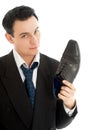Salesman with black leather boot