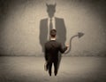 Salesman facing his own devil shadow Royalty Free Stock Photo