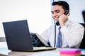 Salesman in office making phone call Royalty Free Stock Photo