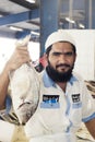 Salesman showing his fresh Fish, Dubai, United Arab Emirates