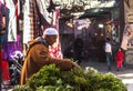 A salesman in Souk market of Marrakech, Morocco