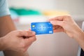 Salesman Taking Credit Card From Customer Royalty Free Stock Photo