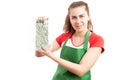 Saleswoman or female shop assistant presenting frozen product Royalty Free Stock Photo