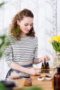 Saleswoman organizing natural oils