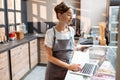 Saleswoman working at the cafe or confectionery shop Royalty Free Stock Photo