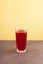 Salgam in drinking glass. Popular Turkish fermented drink, made from fermented purple carrots, turnips or beets