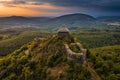 Salgotarjan, Hungary - Aerial view of Salgo Castle Salgo vara in Nograd county with dark storm clouds and golden sunset Royalty Free Stock Photo